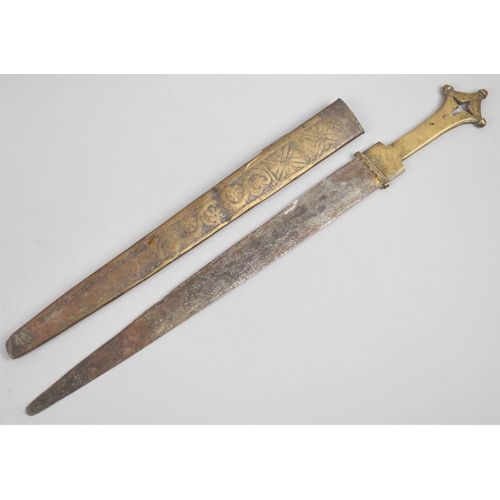 131 - A Brass Handled Ethiopian Short Sword with Brass Scabbard Having Engraved Decoration to One Side, 49... 