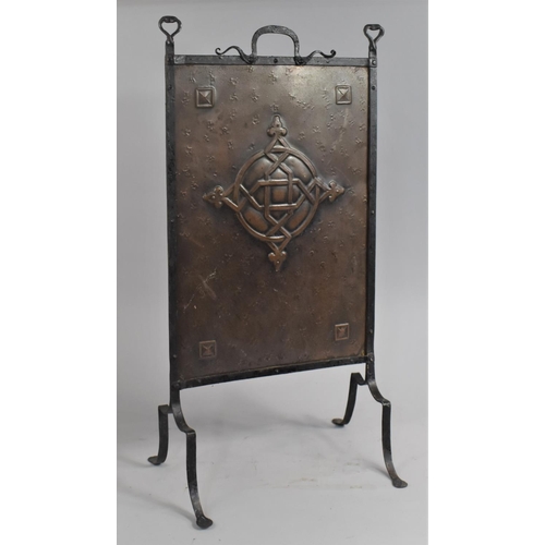 147 - A Wrought Iron and Copper Arts and Crafts Fire Guard, 36cm wide