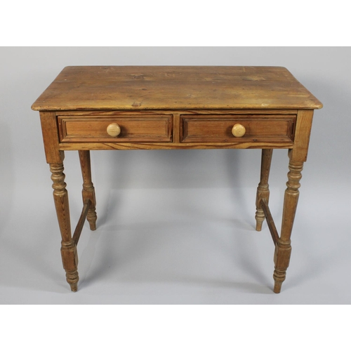 153 - A Late 19th Century Pitch Pine Two Drawer Side Table with Replacement Turned Wooden Handle, 86cm wid... 