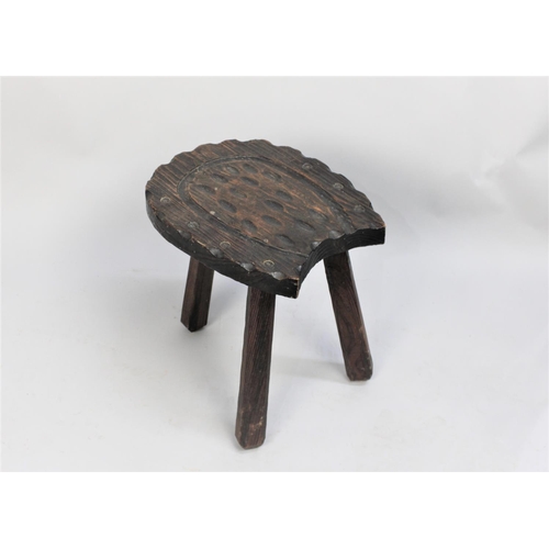 203 - A Mid 20th Century Three Legged Stool with Carved Top in the Shape of a Horseshoe, 35cm wide