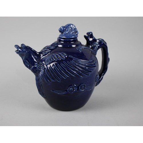 226 - An Unusual Blue Glazed Teapot with Dragon Stylised Handle and Bird Spout