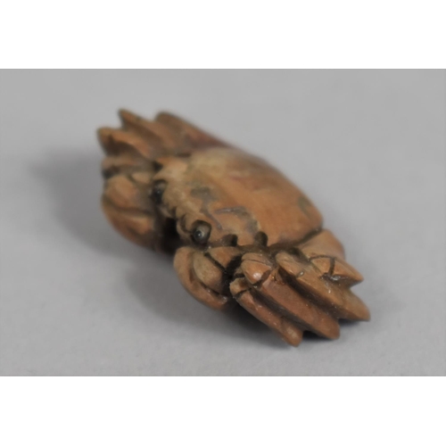 232 - A Small Japanese Carved Wooden Netsuke in the form of a Crab, Signed