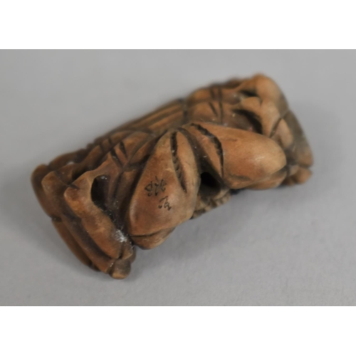 232 - A Small Japanese Carved Wooden Netsuke in the form of a Crab, Signed