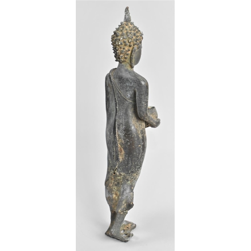 25 - A Late 19th/Early 20th Century Patinated Bronze Temple Figure, Buddha with Hand Raised and Holding B... 