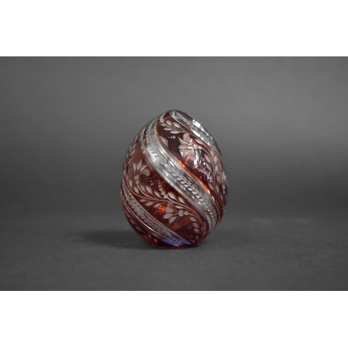 30 - A Replica Faberge Style Glass Egg, 8cm high