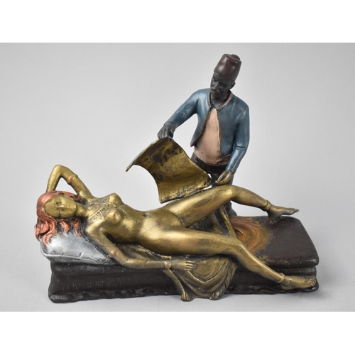 33 - A Reproduction Cold Painted Bronze Erotic Figure Group in the Manner of Bergmann, Magician Standing ... 