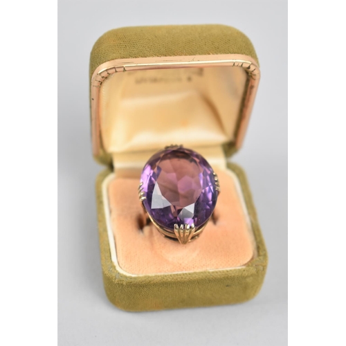 331 - A Yellow Metal Mounted Amethyst Ring, the Large Faceted Cut Stone (Approx. 25ct) Mounted in Stylised... 