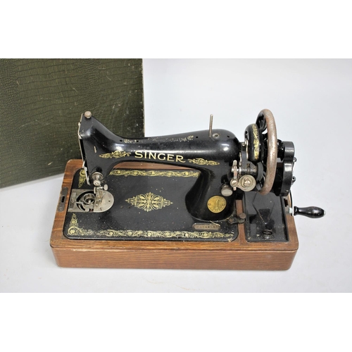 386 - A Vintage Singer Manual Sewing Machine with carry case