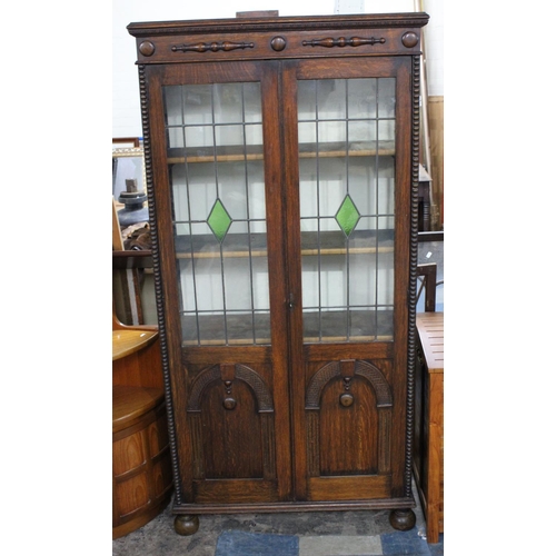 406 - An Edwardian Oak Glazed Bookcase with Four Inner Shelves, Leaded Glass Doors, 91cm wide