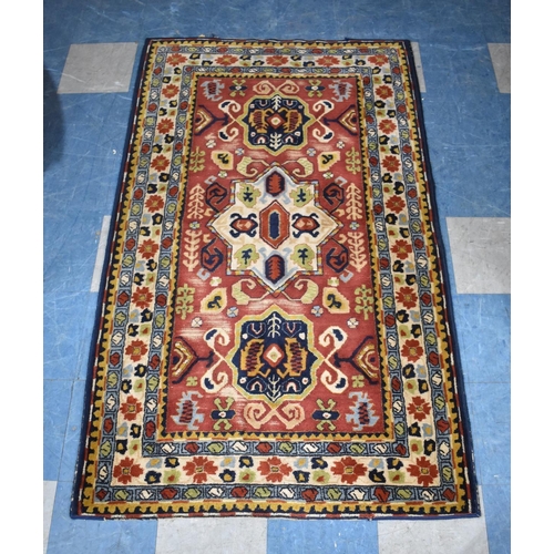 413 - An Antique Tetex Patterned Rug, 192x115cm