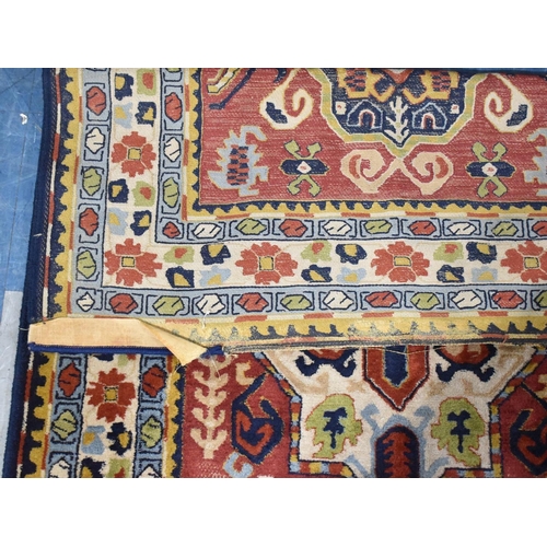 413 - An Antique Tetex Patterned Rug, 192x115cm