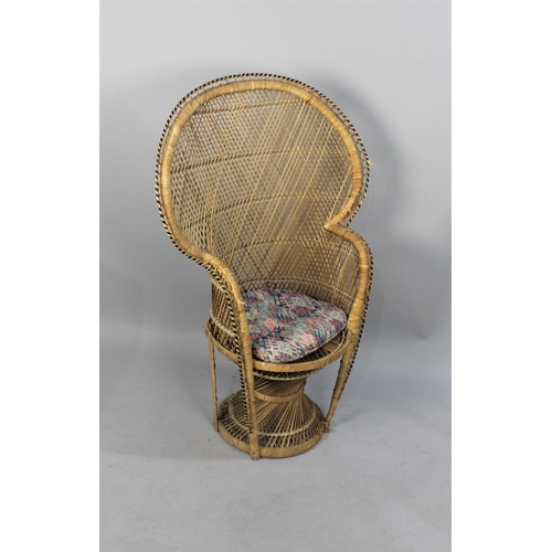 414 - A Woven Cane Back Peacock Chair