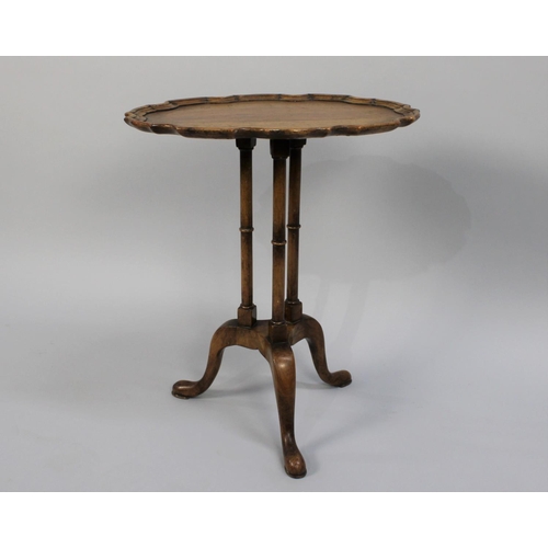 417 - A Mid 20th Century Oval Pie Crust Topped Wine Table on Triple Supports with Tripod Base, 47cm wide