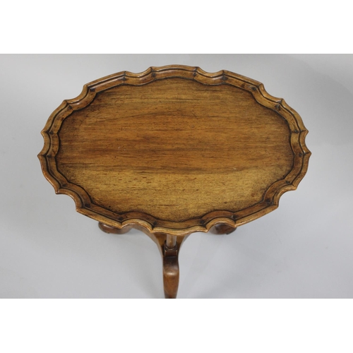 417 - A Mid 20th Century Oval Pie Crust Topped Wine Table on Triple Supports with Tripod Base, 47cm wide