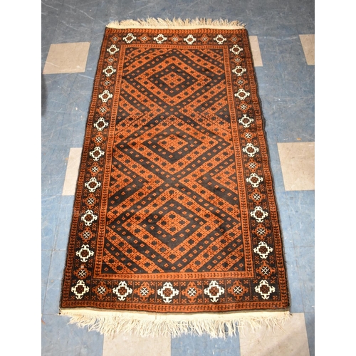 420 - An Antique Hand Made Persian Balouch Rug, 192x107cms