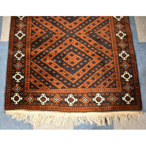 420 - An Antique Hand Made Persian Balouch Rug, 192x107cms