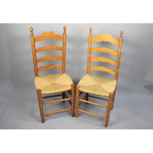 443 - A Pair of Ladder Back Rush Seated Dining Chairs