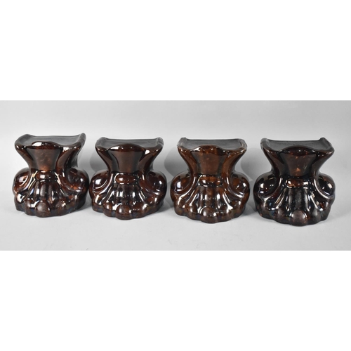 446 - A Set of Four Treacle Glazed Georgian Sash Window Stops