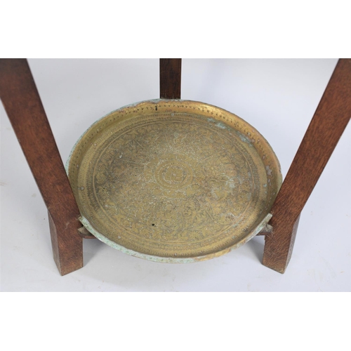 451 - A Mid 20th Century Indian Circular Brass Topped Two Tier Table with Engraved Decoration, 49cm diamet... 