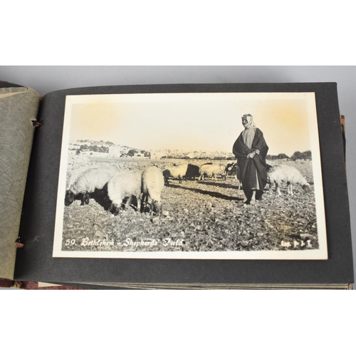 5 - Two olive wood bound items, Book of Common Prayer and middle eastern photo album.