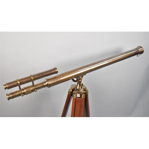 73 - A Reproduction Brass 19th Century Style Telescope on Brass Mounted Tripod, 96cm long