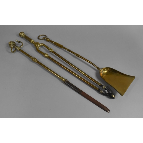 78 - Two Brass Long Handled Fire Irons Together with a Further Unrelated Long Handled Brass Shovel