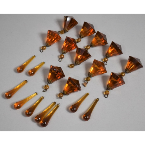 90 - A Collection of Amber Coloured Glass Bead Droppers