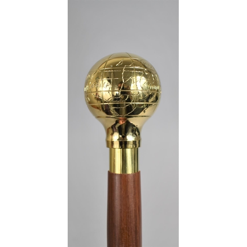 10 - A Modern Turned Wooden Walking Cane with Polished Brass Handle Decorated with Naive Map of The World