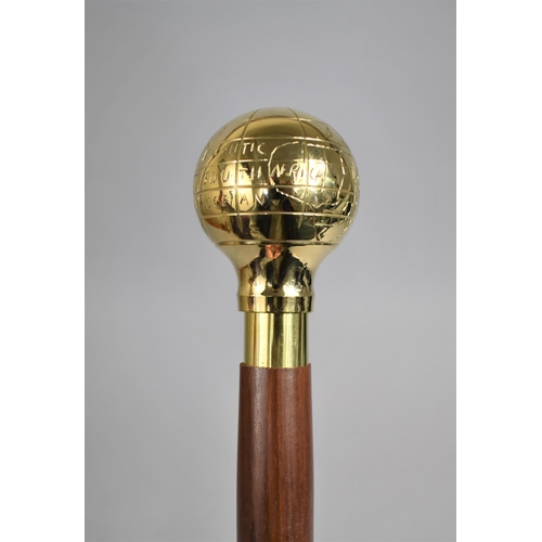 10 - A Modern Turned Wooden Walking Cane with Polished Brass Handle Decorated with Naive Map of The World