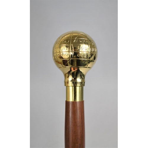 10 - A Modern Turned Wooden Walking Cane with Polished Brass Handle Decorated with Naive Map of The World