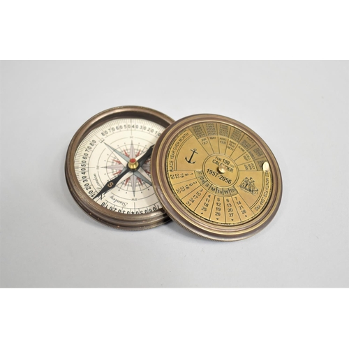 112 - A Reproduction Circular Brass Compass, Screw off lid Engraved with 100 Year Calendar, 1957-2056, 7.5... 