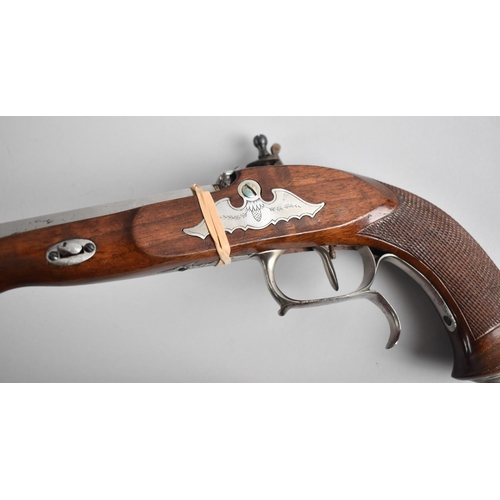 114 - A Reproduction Model of a Flintlock Pistol, In Need of Repair,  39cms Long