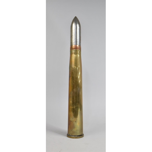 121 - A Spent Brass Cased Shell Dated 1951, Stamped with the War Department Mark, 45cms High