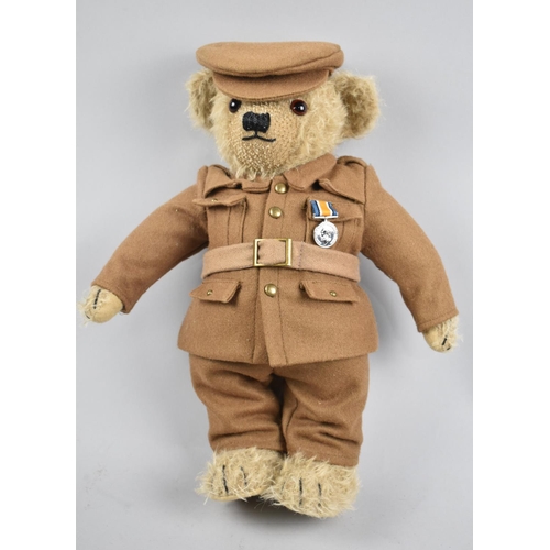 125 - A Merrythought Teddy Bear Dressed in Military Uniform with Medal, 36cms High