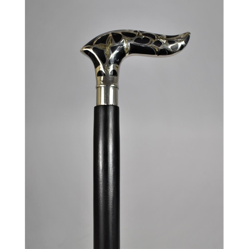 144 - A Modern Ebonized Walking Cane with White Metal Mounted Handle