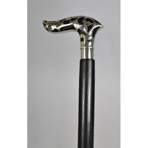 144 - A Modern Ebonized Walking Cane with White Metal Mounted Handle