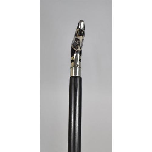 144 - A Modern Ebonized Walking Cane with White Metal Mounted Handle