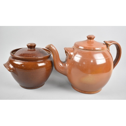 149 - A Large Treacle Glazed Stoneware Teapot together with a Similar Glazed Cooking Pot