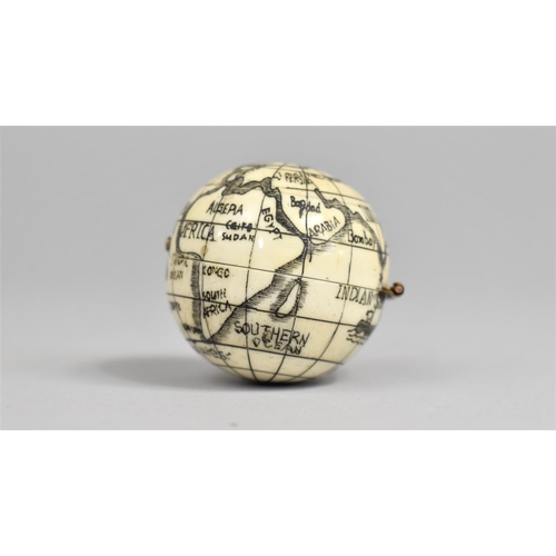 20 - A Reproduction Scrimshaw Style Sundial/Compass of Globular Form, Depicting Map of The World, 3.75cms... 