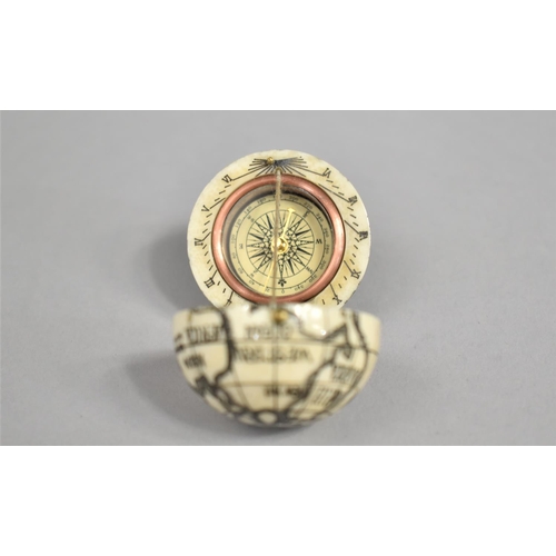 20 - A Reproduction Scrimshaw Style Sundial/Compass of Globular Form, Depicting Map of The World, 3.75cms... 