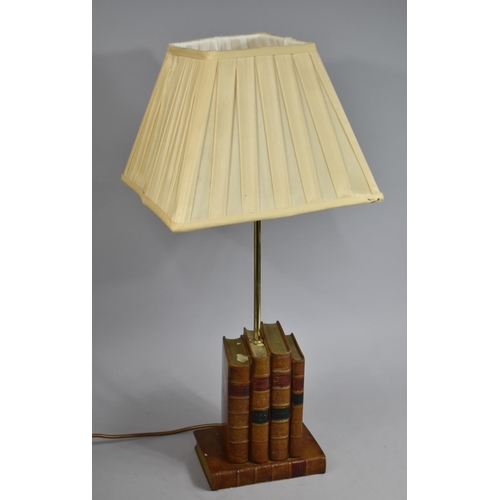 28 - A Novelty Table Lamp in the Form of Leather Bound Books, 64cms High