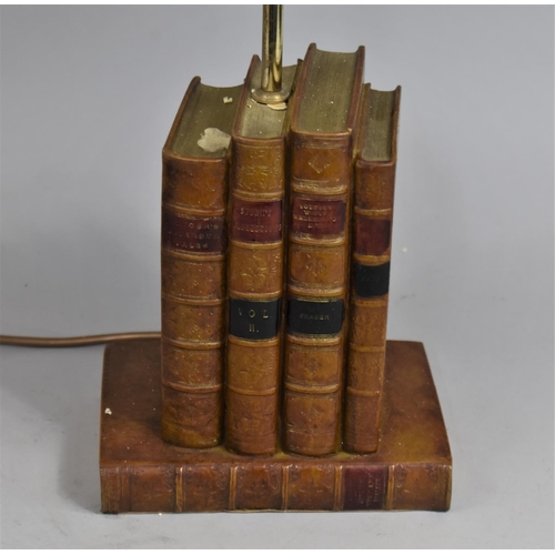 28 - A Novelty Table Lamp in the Form of Leather Bound Books, 64cms High