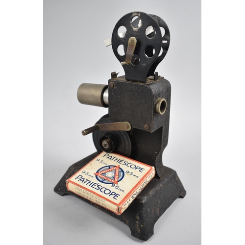 32 - A Vintage Hand Operated Tin Plate Bingoscope Projector together with a Pathescope 9.5mm Film, 