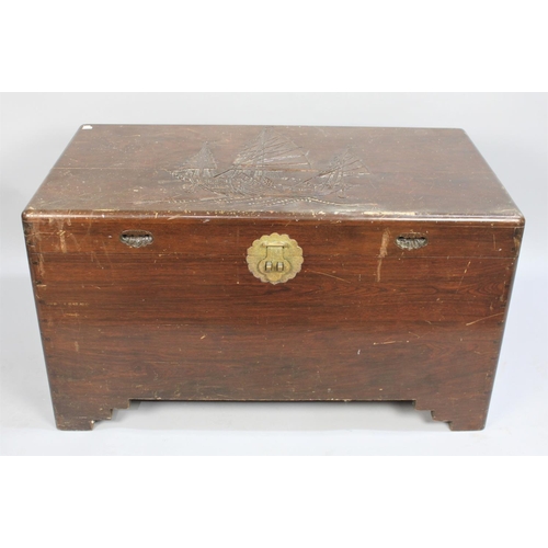 454 - An Oriental Camphor Wood Chest with Carved Lid Depicting Three Masted Ship, 100cm wide