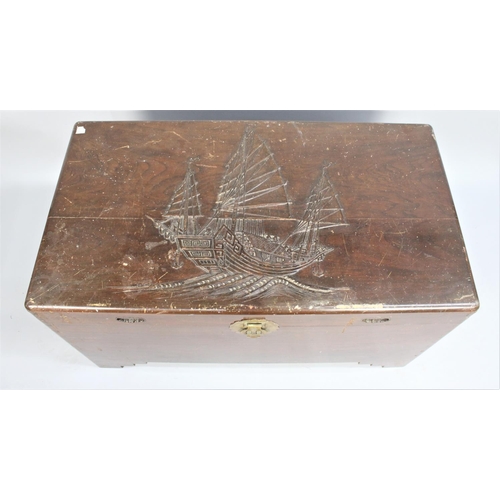 454 - An Oriental Camphor Wood Chest with Carved Lid Depicting Three Masted Ship, 100cm wide