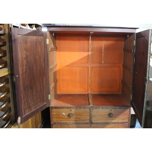 456 - A 19th Century Mahogany Twin Door Linen Press on Two Short and One Long Drawer Base, with Replacemen... 