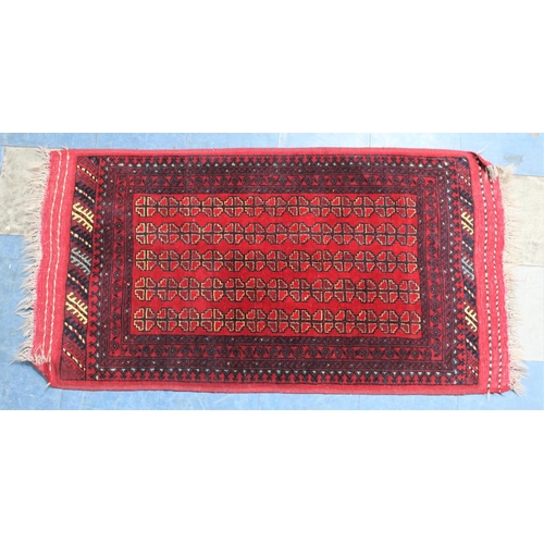 459 - A Vintage Patterned Rug, Geometric Pattern on Red Ground, 147x78cm