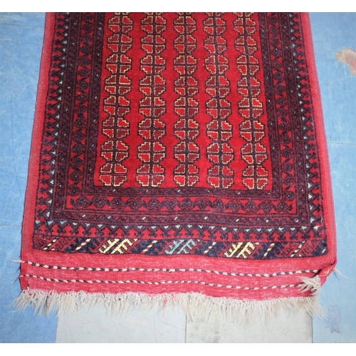 459 - A Vintage Patterned Rug, Geometric Pattern on Red Ground, 147x78cm