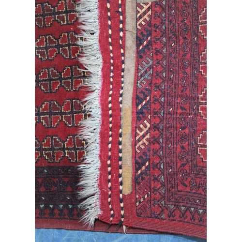 459 - A Vintage Patterned Rug, Geometric Pattern on Red Ground, 147x78cm