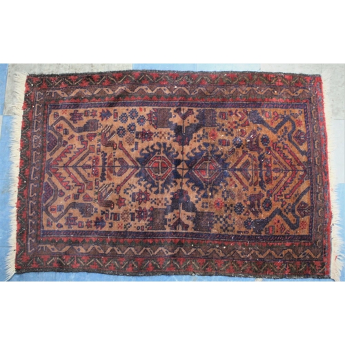 460 - A Vintage Patterned Rug, 140x90cm